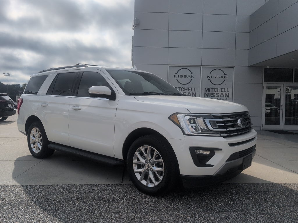 2020 Ford Expedition XLT in Star White Metallic Tri-Coat — front three-quarter view