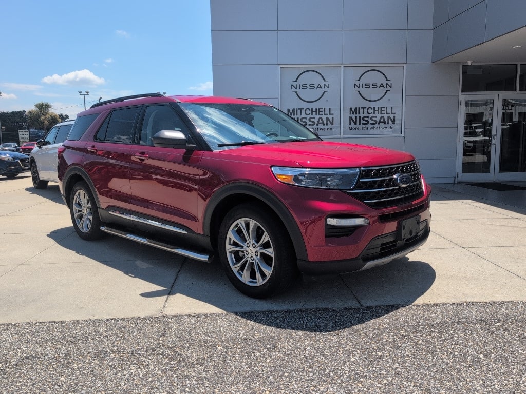 2021 Ford Explorer XLT in Rapid Red Metallic Tinted Clearcoat — front three-quarter view