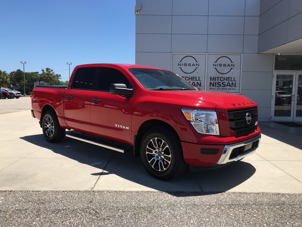 2024 Nissan Titan Crew Cab SV in Red Alert — front three-quarter view