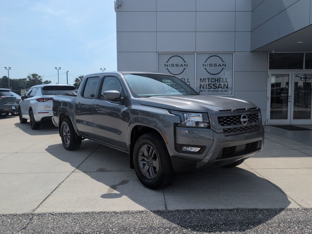 2025 Nissan Frontier Crew Cab SV in Gun Metallic — front three-quarter view