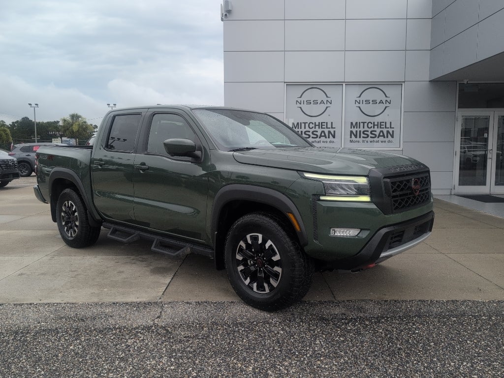 2023 Nissan Frontier Crew Cab PRO-4X in Tactical Green Metallic — front three-quarter view