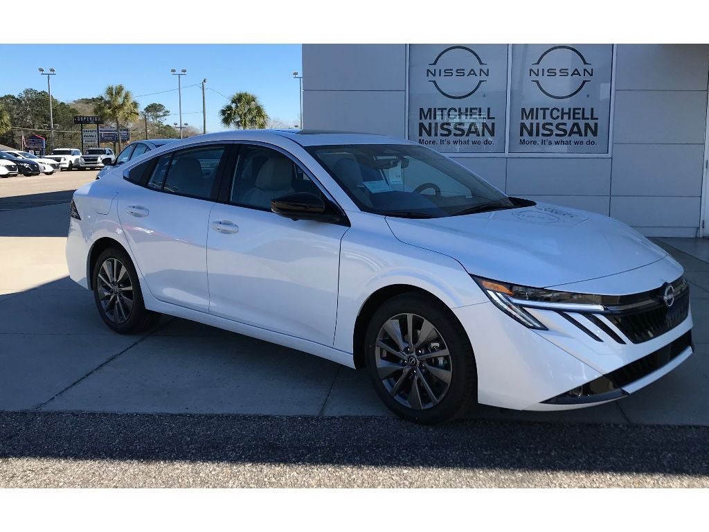 2026 Nissan Sentra SL in Aspen White Tricoat — front three-quarter view