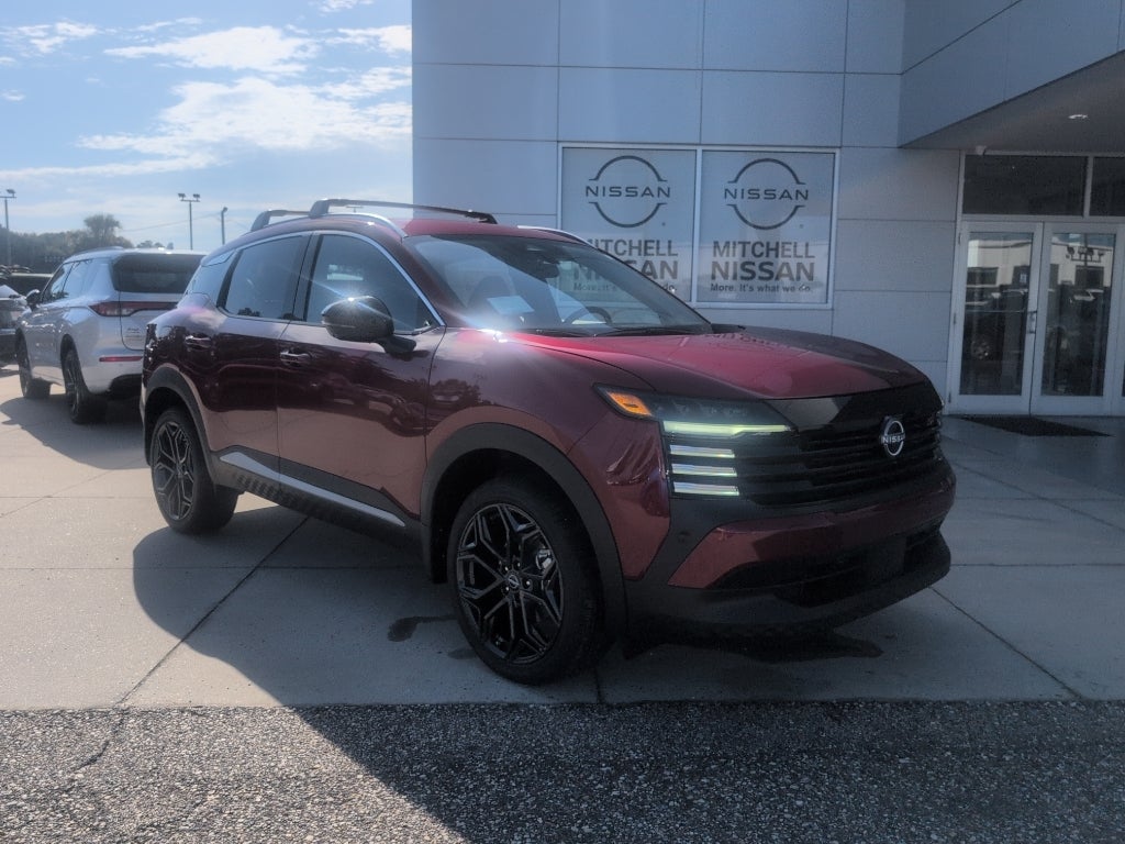 2026 Nissan Kicks SR in Scarlet Ember Tintcoat — front three-quarter view