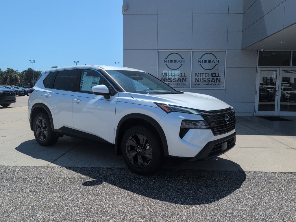 2026 Nissan Rogue SV in Everest White Pearl Tricoat — front three-quarter view