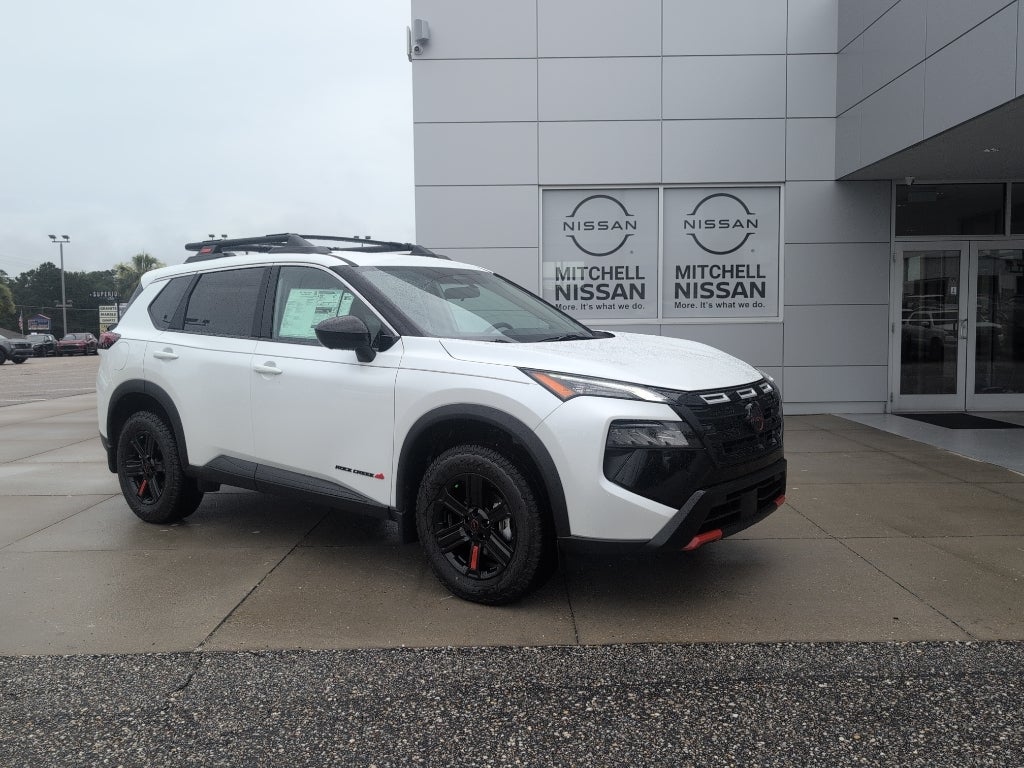 2026 Nissan Rogue Rock Creek in Everest White Pearl Tricoat — front three-quarter view
