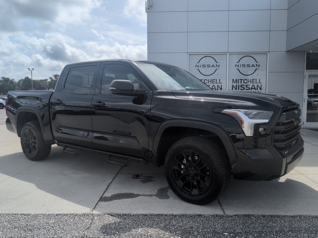 2024 Toyota Tundra SR5 in Midnight Black Metallic — front three-quarter view