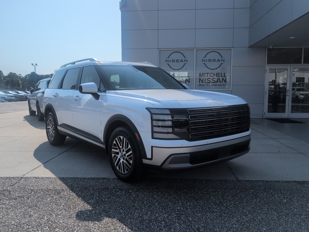2026 Hyundai Palisade SEL 7P in Creamy White Pearl — front three-quarter view